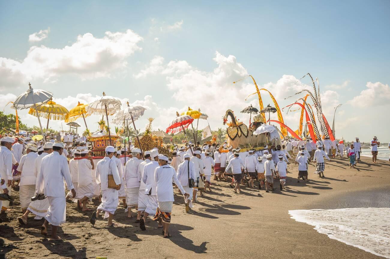 As a land blessed with vibrant culture and ancient traditions, there is a ritual which is considered as one of the most sacred in Bali - the Melasti Ceremony. A grand purification spectacle that precedes the tranquil Nyepi Day, Melasti is not merely a procession; it is a profound spiritual journey to cleanse both the human soul (Bhuwana Alit) and the entire universe (Bhuwana Agung) from impurities and negative influences.  The Virtuous Melasti Ceremony: Embracing Sacred Purification for Nyepi Day in Bali  M