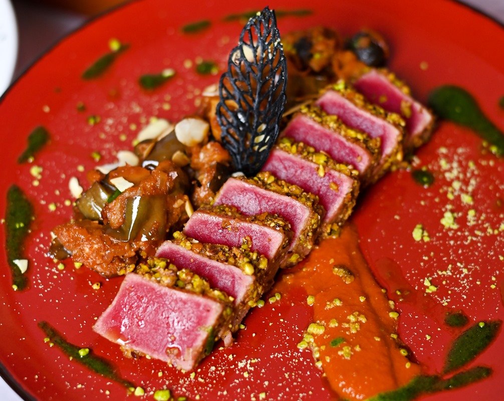 Crusted Pistachio Tuna with Eggplant Capotana and Bell Pepper Cream