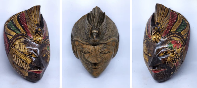 Hand-carved wooden masks and figurines