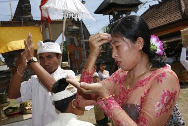 Blessed Rice Grains: The Significance of Bija in Balinese Ceremony